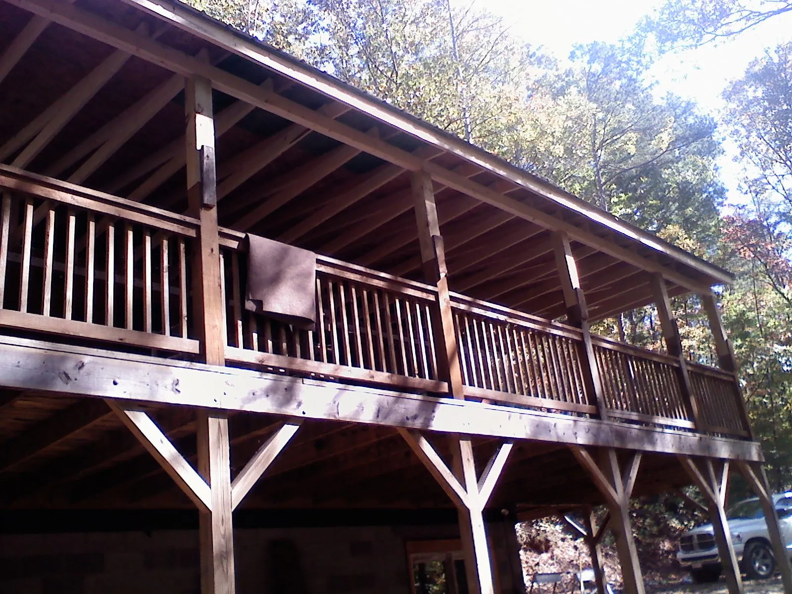 Timber framing under a new elevated porch and deck — Roof Leak Repair in Eustis by Roofing Brothers